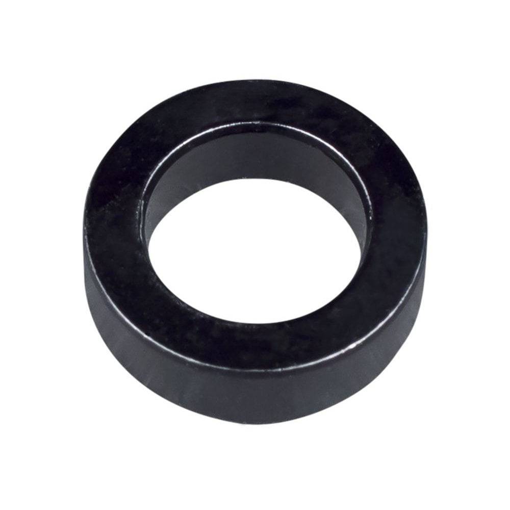 Black Trek shock assembly spacer, 5mm x 10mm, for full-suspension bike frames, showcasing the component's compact size and design.