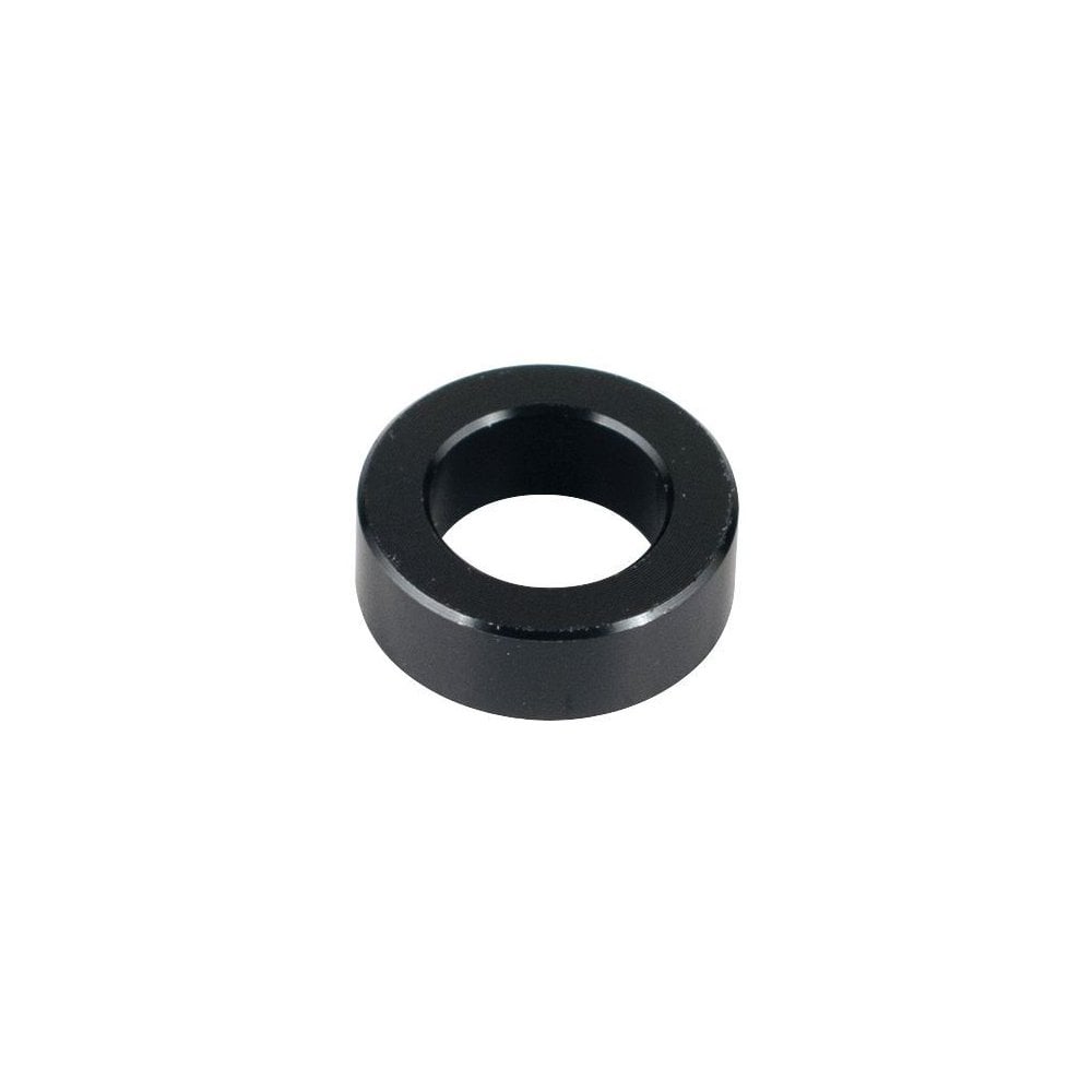 Trek Rocker Link Spacer 5.7mm x 10mm in black for full-suspension bike components, showing a close-up of the spacer part.