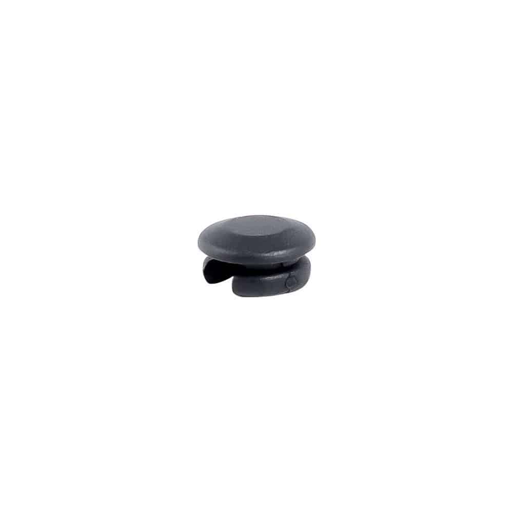 Black Trek round seat tube wire routing frame plug for mechanical shifting cable management on bicycle frame.