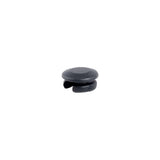 Black Trek round seat tube wire routing frame plug for mechanical shifting cable management on bicycle frame.