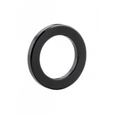 Trek 2009 Top Fuel black rocker link pivot spacer, 2mm x 12mm suspension component, close-up view of the black metal spacer.