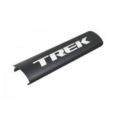 Trek Allant+ 9.9 black chrome battery cover, protective case for e-bike battery components, shown on a black surface.