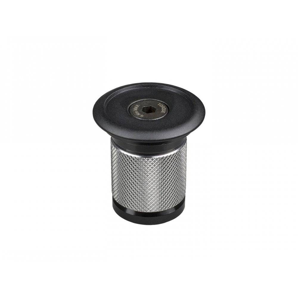 Black Bontrager headset expander plug and top cap for 1-1/8 inch carbon fiber steer tubes, compatible with Trek bicycles.