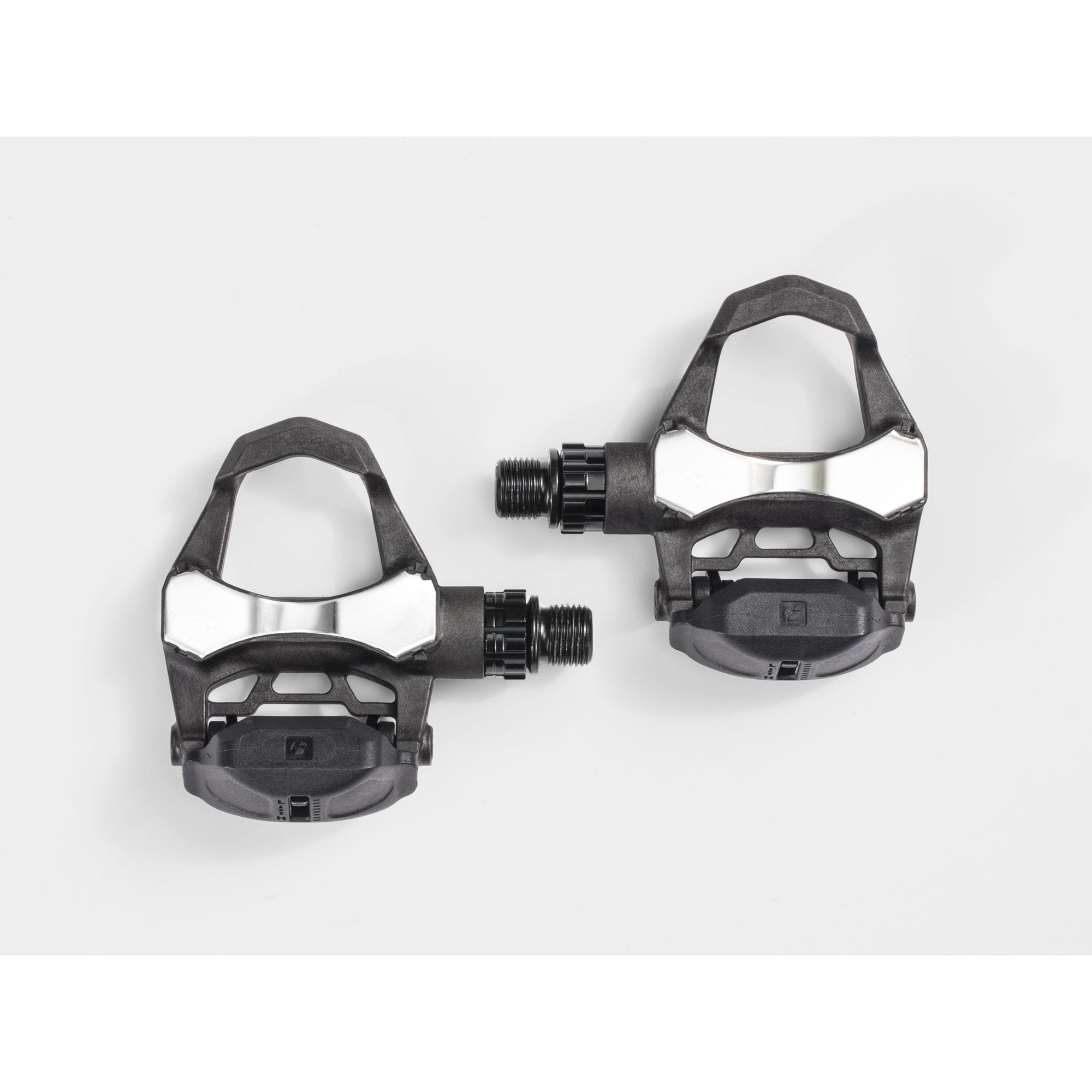 Bontrager Elite Road Pedal Set in black with cleats and adjustable tension, compatible with 9/16-inch crank arms for cycling.