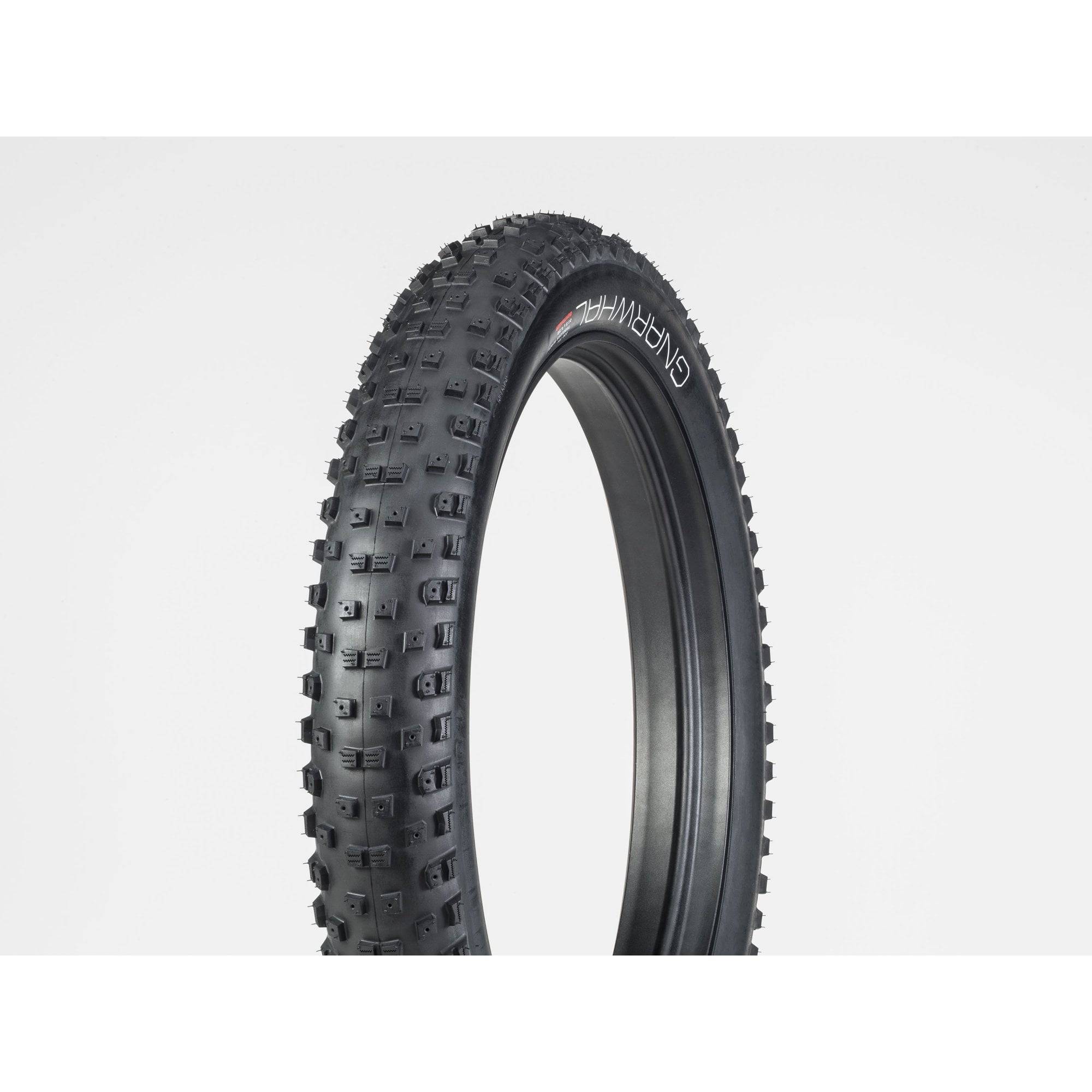 Bontrager Gnarwhal 27.5-inch fat bike tire in black, tubeless-ready, studdable for off-road riding on rugged terrain.