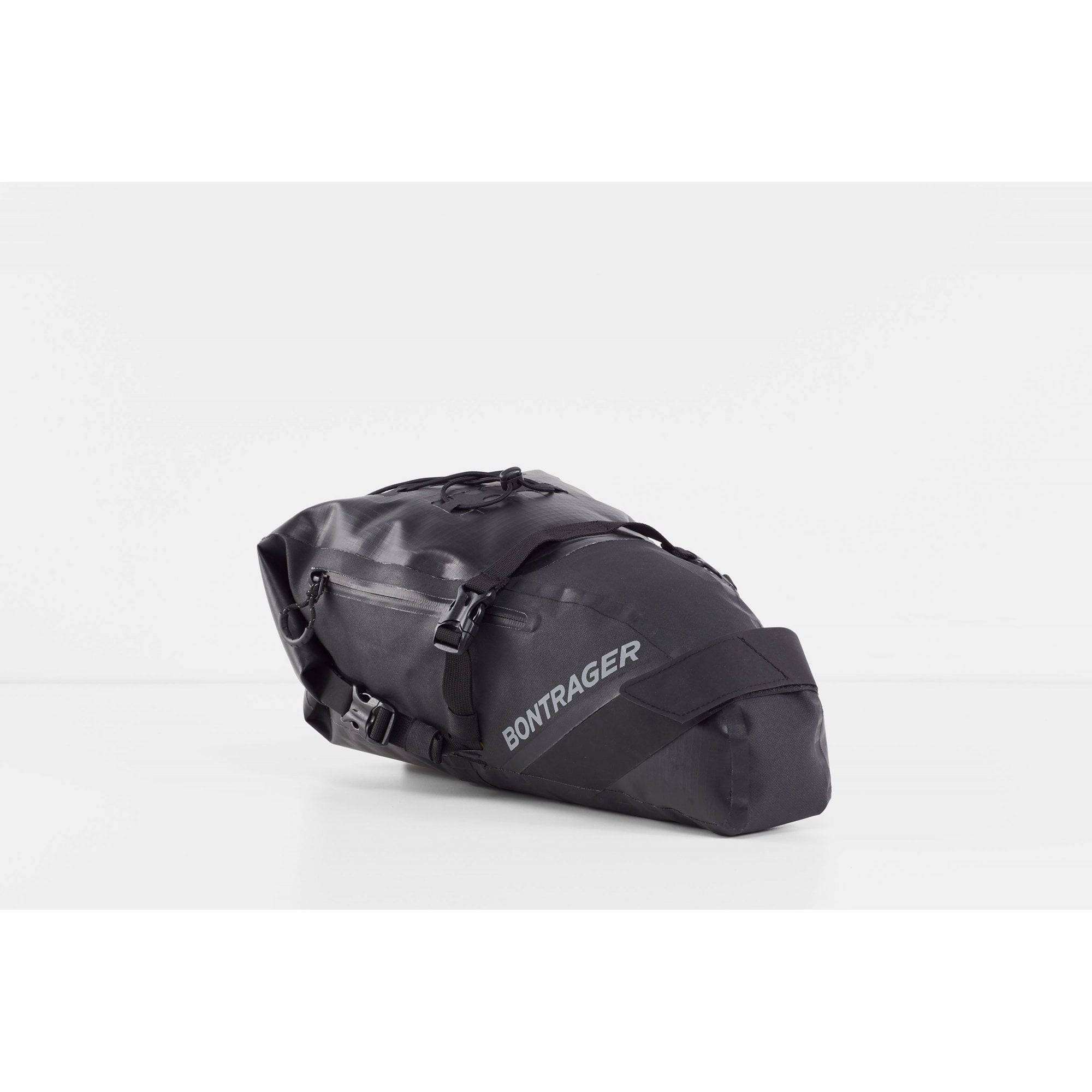 Bontrager Adventure 9L black water-resistant saddle bag attached to a bike, designed for bike storage accessories.