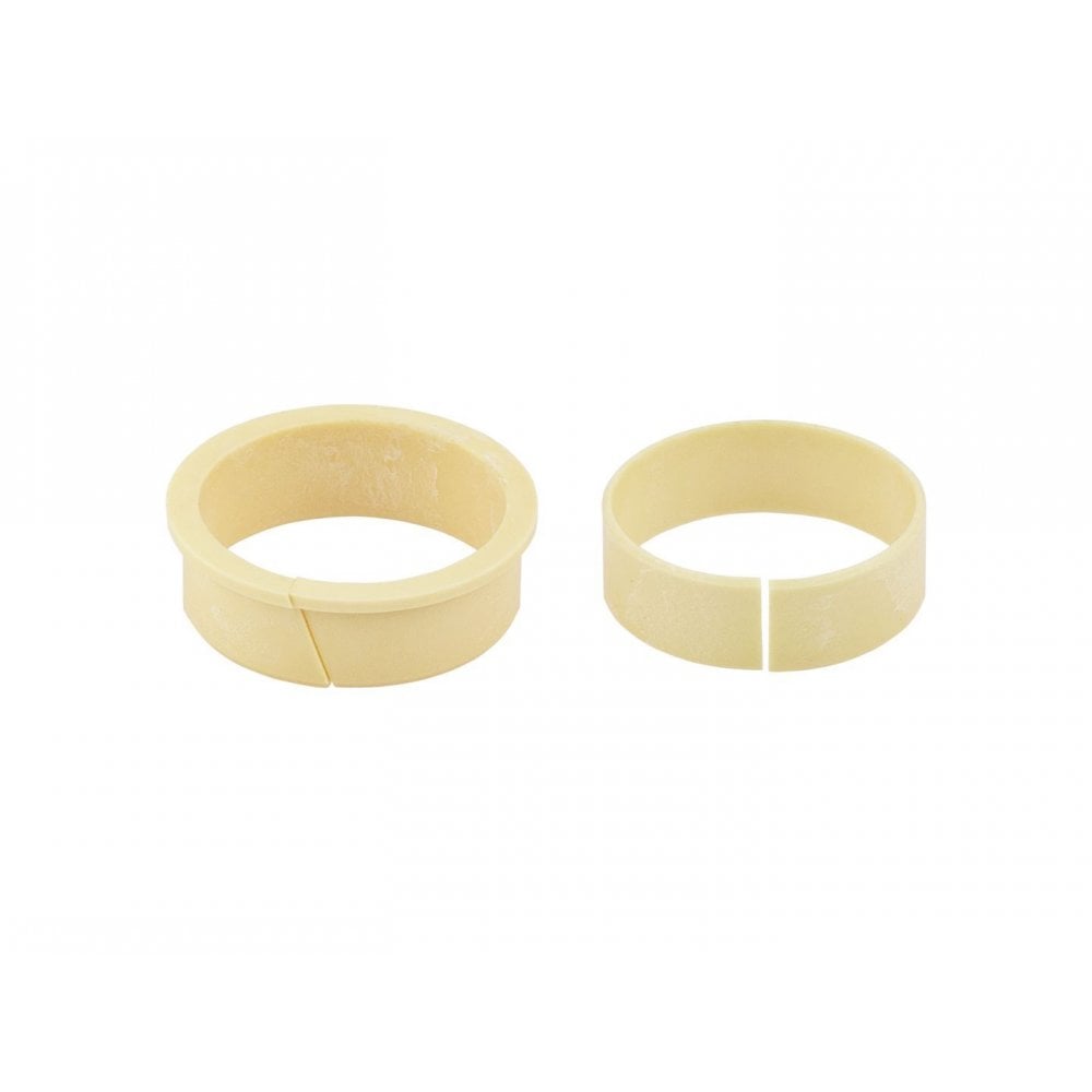 Bontrager Line Elite 34.9mm dropper post bushing kit in cream color, replacement component for bike dropper post parts.