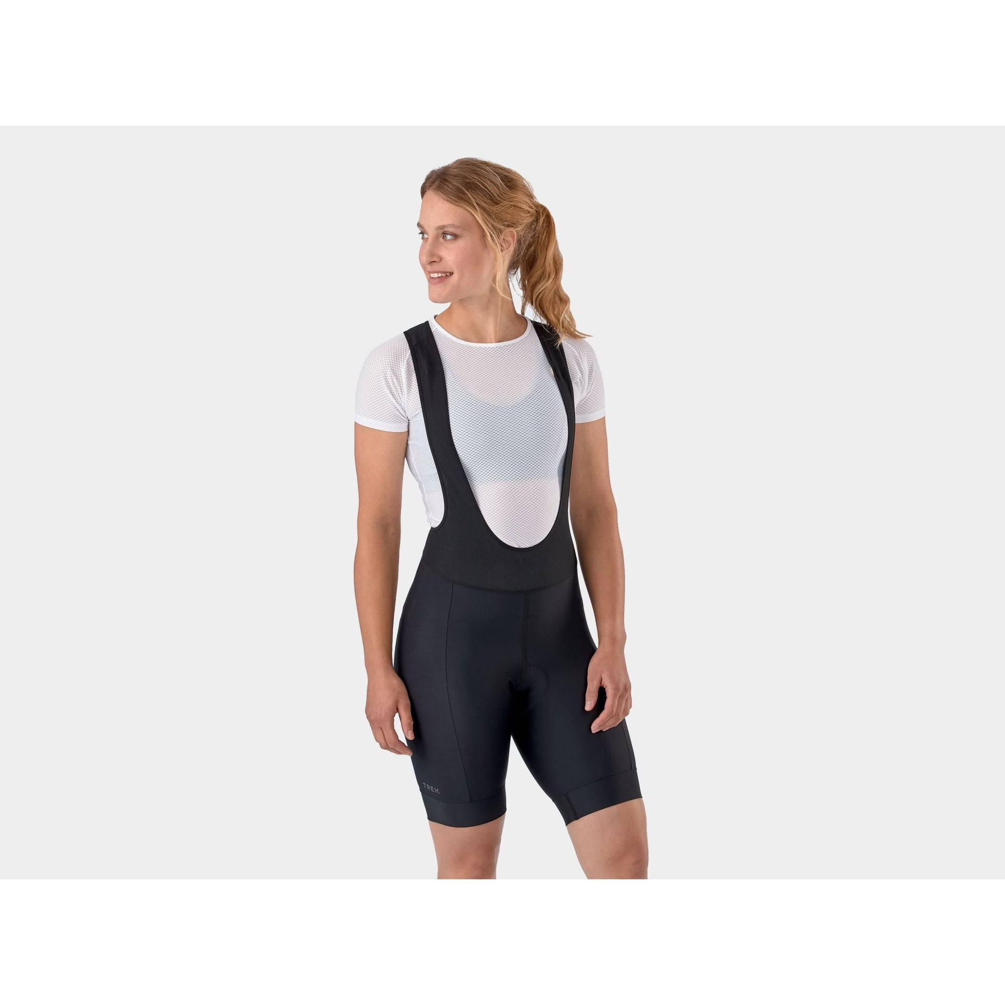 Trek Solstice unisex cycling bib shorts made of eco-friendly fabric, featuring a fitted design and padded chamois for comfort.