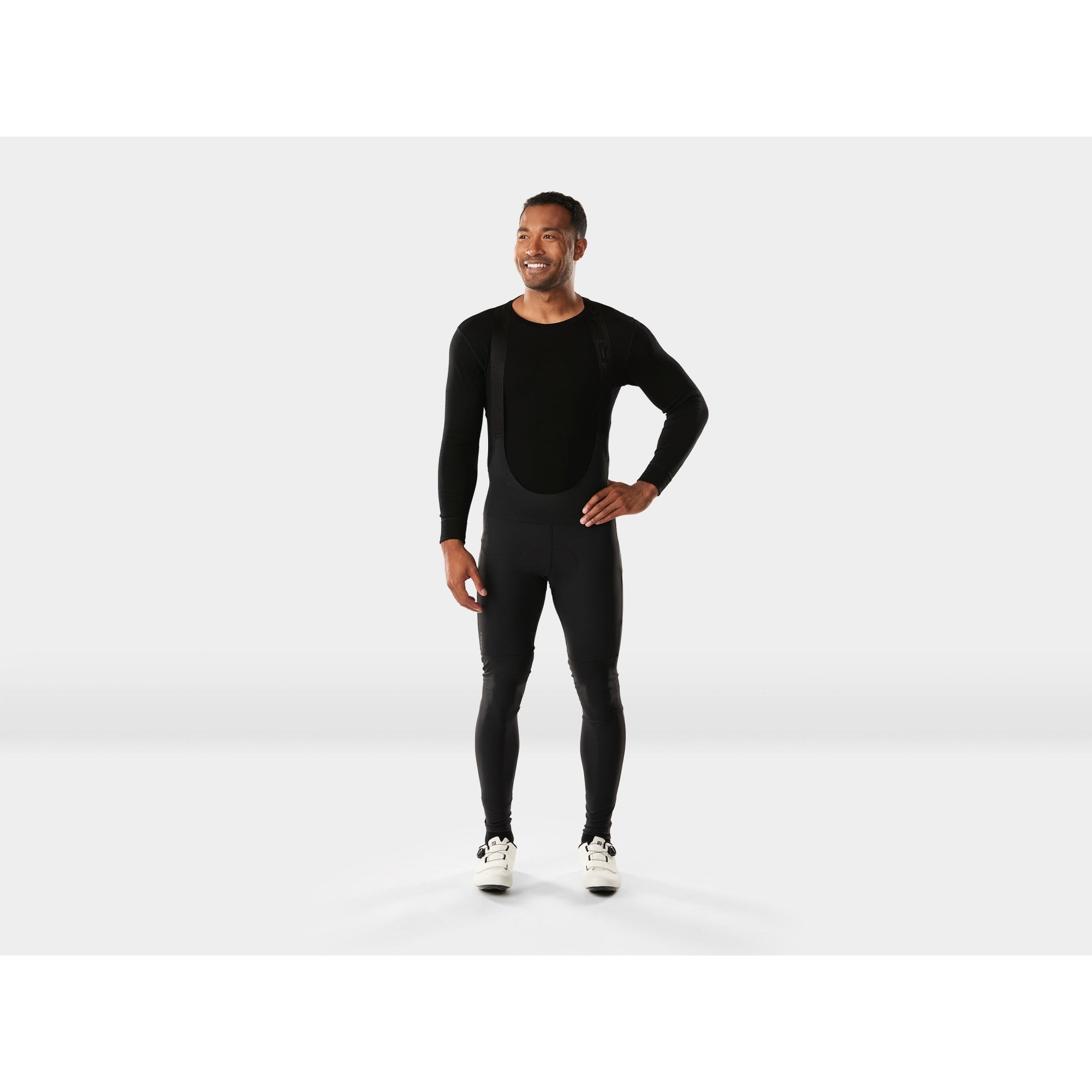 Trek Circuit Thermal Cycling Bib Tights in black, designed for cold weather riding, featuring warm, comfortable long-length cycling clothing.