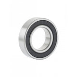 Bontrager 6902 LLH silver bike hub bearing for wheel and hub replacement, showing close-up of bearing in a natural setting.