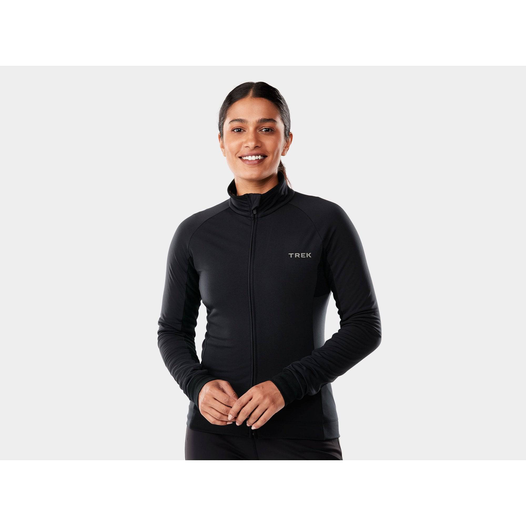 Trek Circuit Women's thermal long sleeve cycling jersey in black, designed for cool weather rides, with a fitted athletic cut.