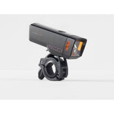 Trek Commuter Pro RT front bike light in black with 1000 lumens, USB-C rechargeable, mounted on a bicycle handlebar.