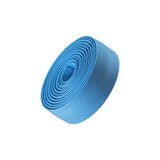 Bontrager gel cork handlebar tape with cushioning and reflective bar end plugs for road bike handlebars.
