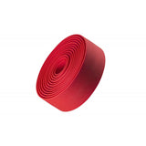 Bontrager Gel Cork Handlebar Tape with gel cushioning and reflective bar end plugs on a bicycle handlebar.