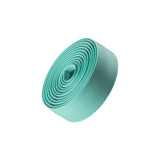 Bontrager Gel Cork Handlebar Tape with gel cushioning and reflective bar end plugs on a bicycle handlebar.