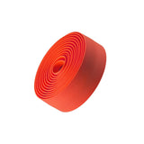 Bontrager gel cork handlebar tape with cushioning and reflective bar end plugs for bike handlebars.