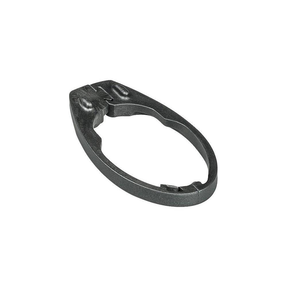 Trek Madone SLR headset spacers for precise steering, shown as frame spare parts in the image.