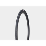 Bontrager AW1 Hard-Case Road Tire with Triple Flat Protection, shown mounted on a bicycle wheel for durability and speed.