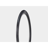 Bontrager AW1 Hard-Case Road Tire with Triple Flat Protection for durability and speed, shown mounted on a bicycle wheel.