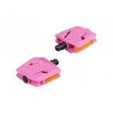 Trek Kids' small flat platform pedal set for children's bikes, showing the black plastic pedals with textured surface for grip.