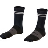 Trek Race Reflective Crew Cycling Socks with compression, eco-friendly yarn, shown on a model's feet, ideal for cycling comfort.