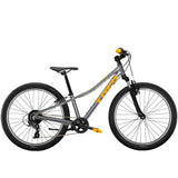 Trek Precaliber 24 kids' bike with 8-speed twist shifter and front suspension, designed for young riders and outdoor fun.