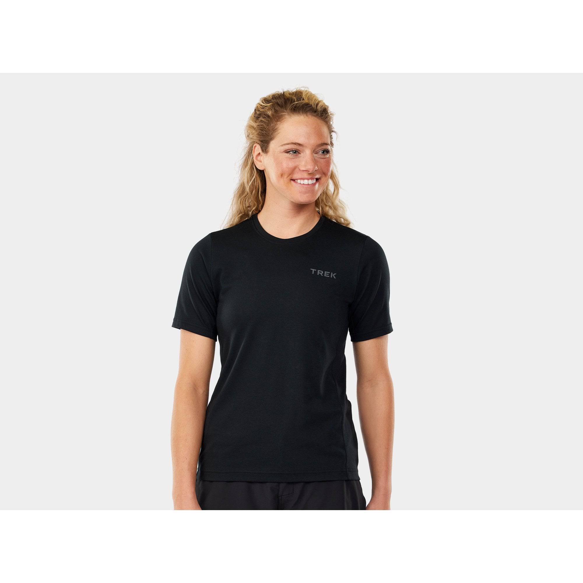 Trek Evoke women's mountain bike tech tee jersey, breathable cycling shirt with moisture-wicking fabric and sporty fit.