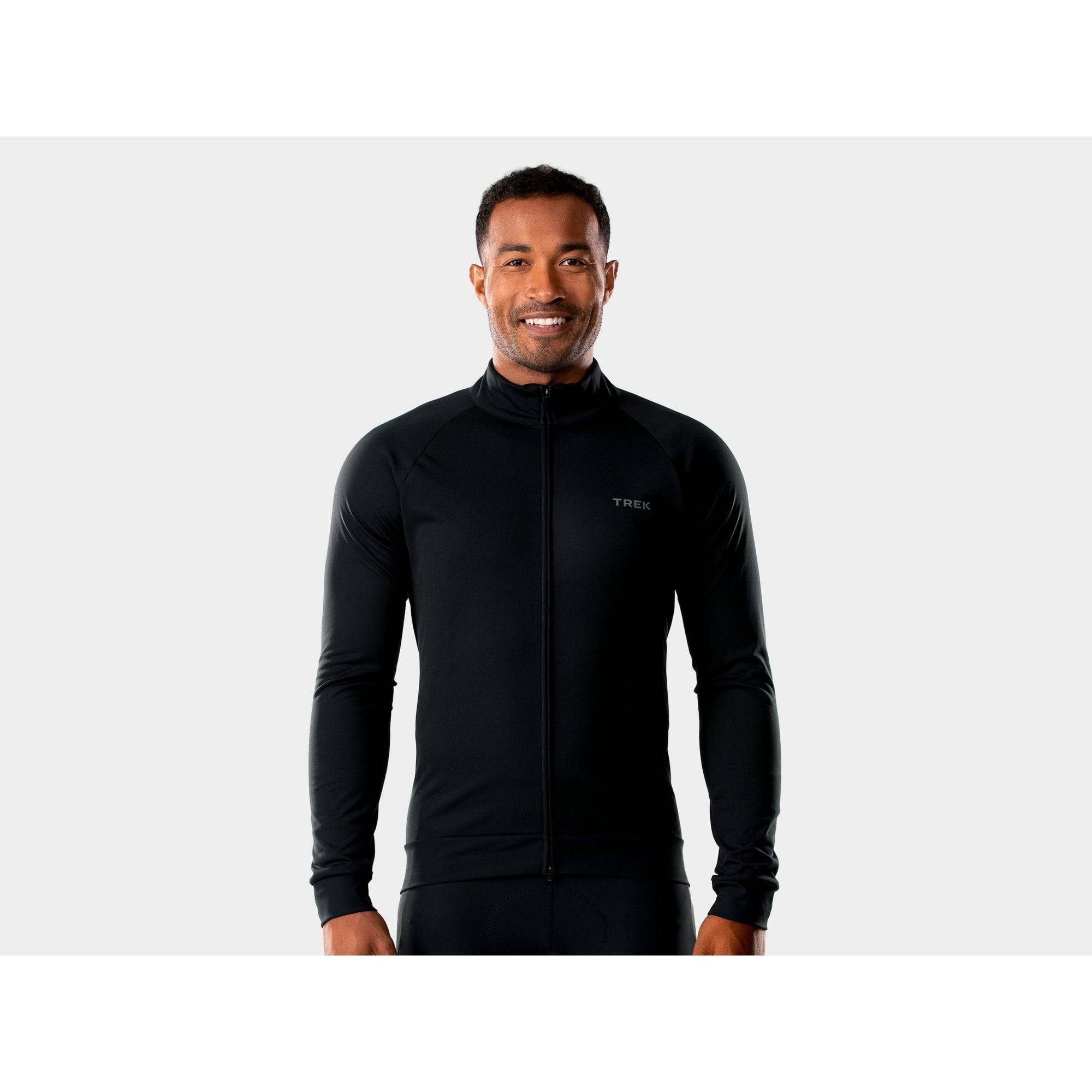 Trek Circuit softshell cycling jacket with fleece lining, windproof and waterproof, designed for outdoor cycling comfort.