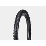 Bontrager SE4 Team Issue TLR MTB tire mounted on a bike, showing tread pattern and tubeless-ready sidewall for enduro racing and trail riding.