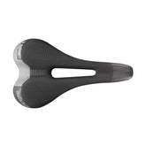 Selle Italia ST3 Superflow commuter saddle with black cover, Hi-Viz reflective inserts, and ergonomic design for bike riding.