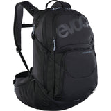EVOC Explorer Pro 26L performance backpack with helmet holder and hydration compartment, designed for outdoor and cycling adventures.