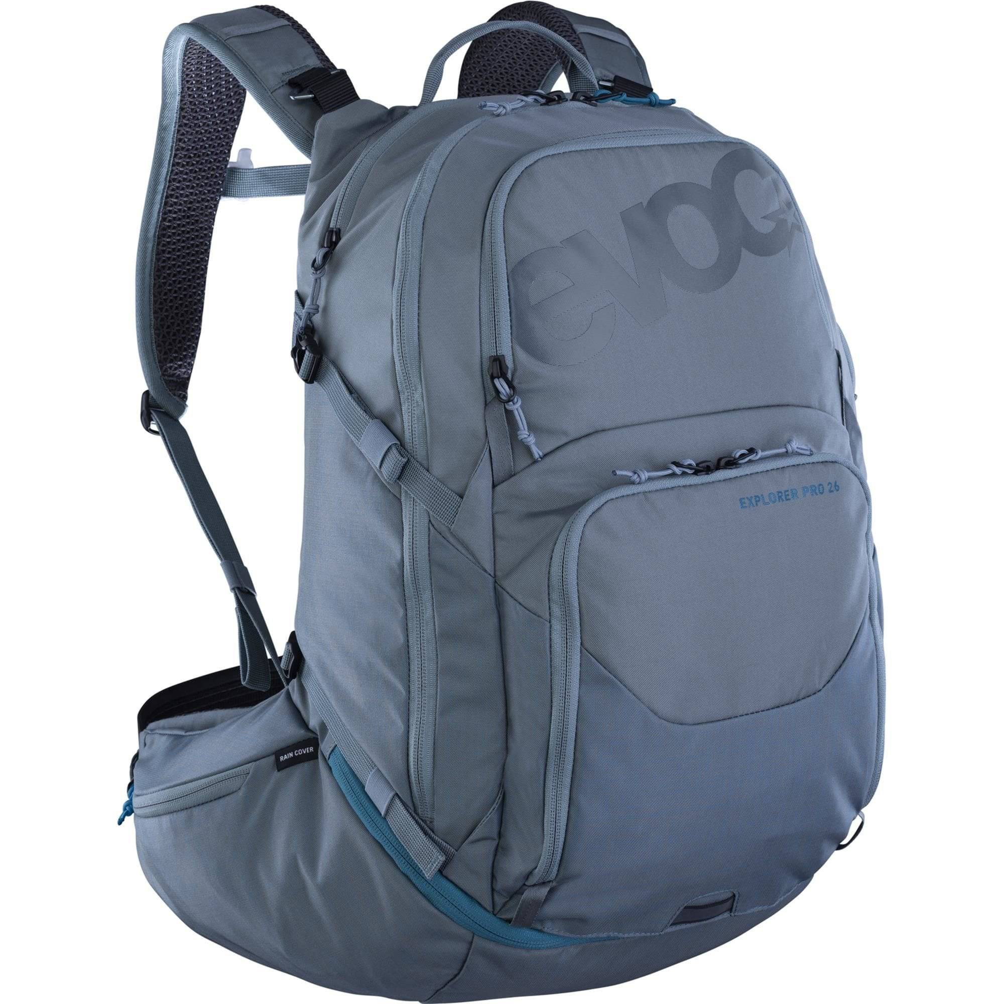 EVOC Explorer Pro 26L backpack with helmet holder and hydration compartment for outdoor adventures and cycling.
