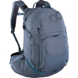 EVOC Explorer Pro 26L backpack with helmet holder and hydration compartment for outdoor adventures and cycling.