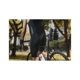 Topeak Tri Cage 2 black lightweight bike water bottle cage attached to saddle carrier for cycling accessories