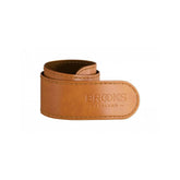 Brooks leather trouser strap in honey color, designed as cycling accessory for chain grease protection.