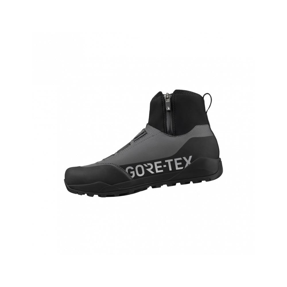 Fizik Terra Ergolace GTX waterproof flat MTB shoes with Vibram outsole, black with textured material and secure laces.