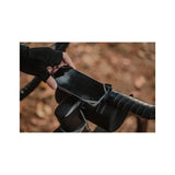 Topeak Omni Ridecase II bike phone mount with stem multi-mount in black, securely holding smartphone on bicycle handlebars.
