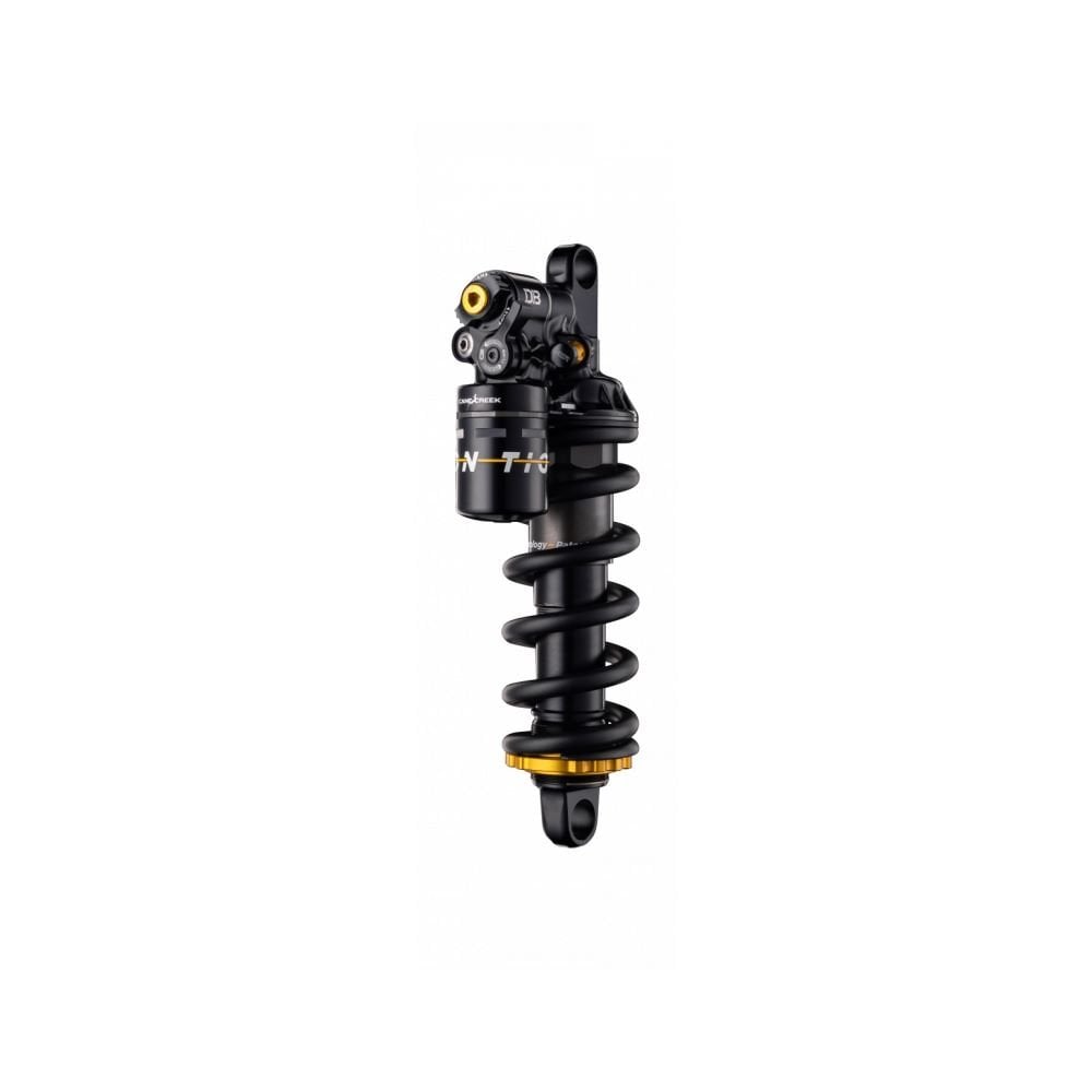 Cane Creek Tigon Coil rear shock with RAMP Tube technology for trail bikes, showing the suspension component with coil spring.
