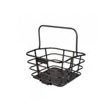 Topeak Urban Basket DX pannier bag with quick-release mount on a bicycle rack, designed for MTX, MIK, and Racktime racks.