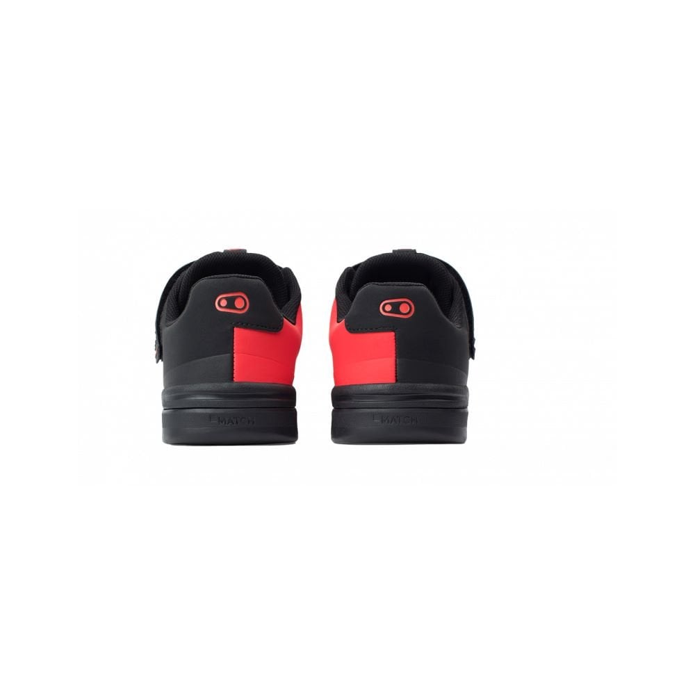 Crank Brothers Stamp Speedlace MTB shoes for flat pedal mountain biking, featuring black and gray design with breathable mesh uppers.
