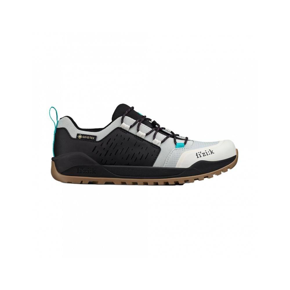 Fizik Terra Ergolace GTX waterproof flat MTB shoes with Vibram outsole, showcasing durable cycling footwear for mountain biking.