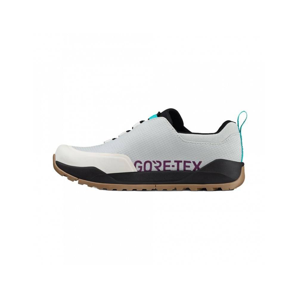 Fizik Terra Ergolace GTX waterproof MTB shoes with Vibram outsole, flat design, black and gray, outdoor cycling footwear.