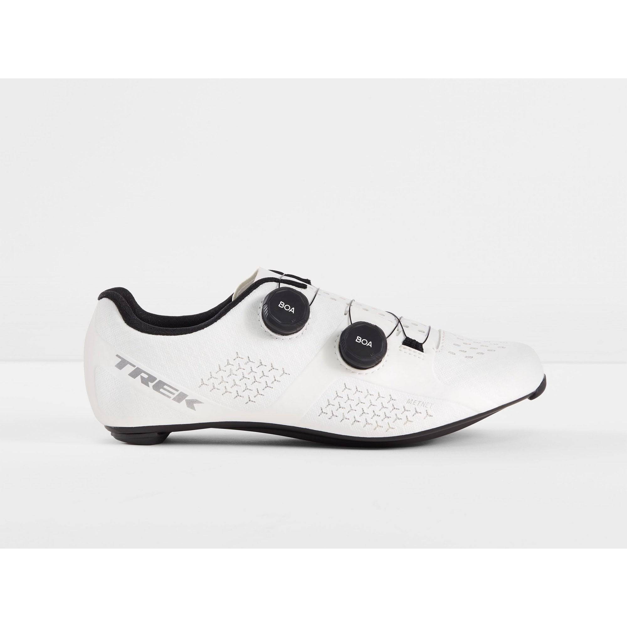 Trek Velocis unisex road cycling shoes in black, red, and white with sleek design and secure strap closures.