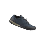 Shimano GF4 Gravel Shoes with ULTREAD® Grip for flat pedals, black cycling shoes designed for gravel riding and durability.
