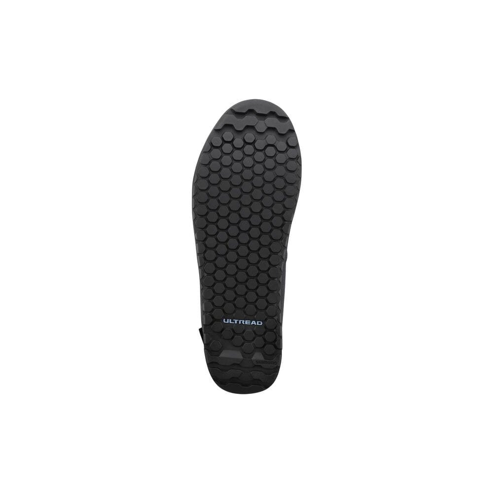 Shimano GF4 gravel shoes with ULTREAD grip for flat pedals, featuring breathable fabric and secure fit for mountain biking.