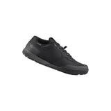 Shimano GF4 gravel shoes with ULTREAD® grip for flat pedals, featuring durable textile upper and cleat compatibility for cycling.