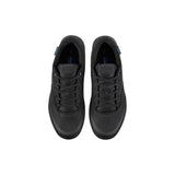 Shimano GF4 gravel shoes with ULTREAD® grip for flat pedals, black and gray, designed for cycling and outdoor adventures.