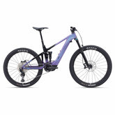 Liv Intrigue X Advanced E+ Elite 2 women’s e-mountain bike with Shimano SLX M7100 drivetrain, black frame, and mountain bike tires.