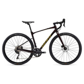 Giant Revolt 1 2024 gravel bike with Shimano GRX 400 disc brakes, black frame, knobby tires, and drop handlebars.
