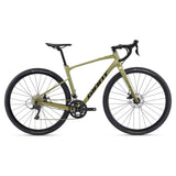 Giant Revolt 2 2024 gravel bike with Shimano Sora R3000 shifters and disc brakes, unisex bike on rugged trail.